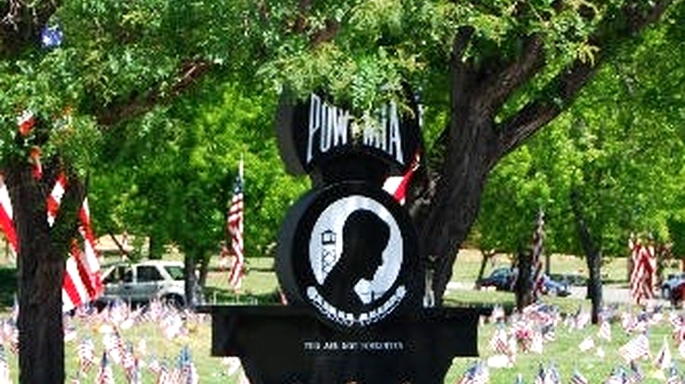 POW/MIA monument surrounded by American flags